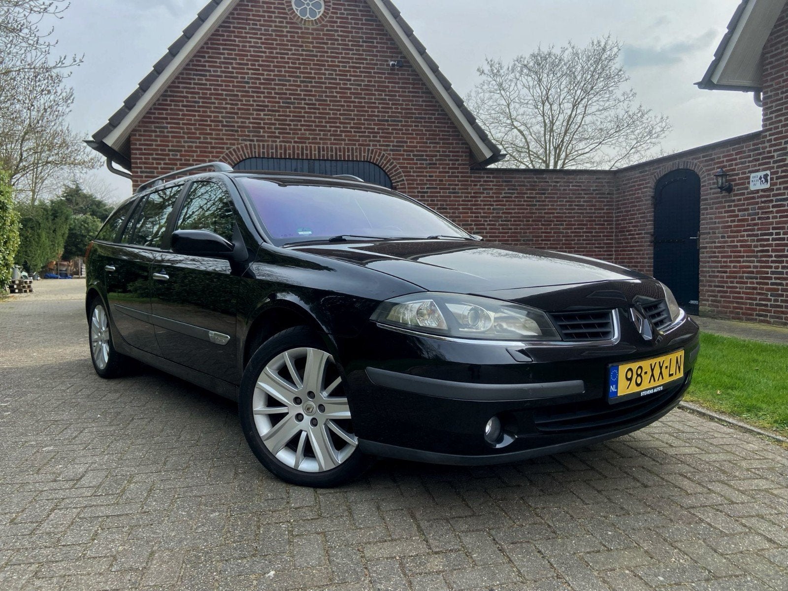 Renault Laguna 2.0 16V Gr.tour 100KW E4 2007 Zwart LPG, Auto's, Voorwielaandrijving, Zwart, Leder en Stof, Zwart