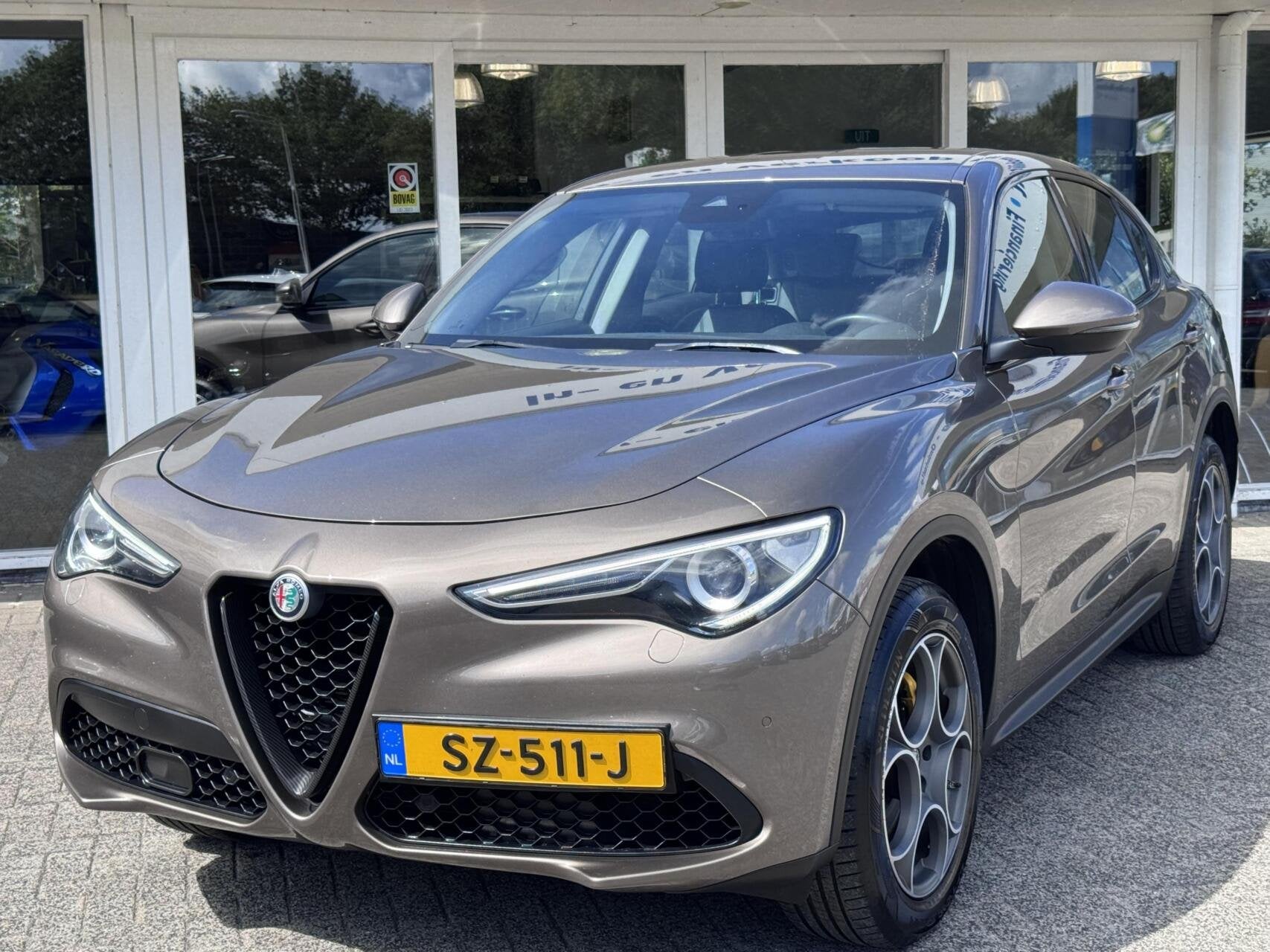 Alfa Romeo Stelvio 2.0 T 200pk Automaat AWD Super,Clima,Crui, Auto's, Automaat, Leder en Stof, Vierwielaandrijving, 1600 kg