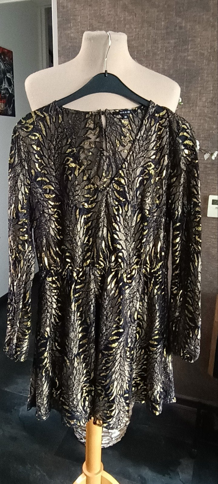 Mooie blauwe/gouden jurk van Nikkie maat 38

Lengte 90 cm, Blauw, Zo goed als nieuw, Boven de knie, Ophalen