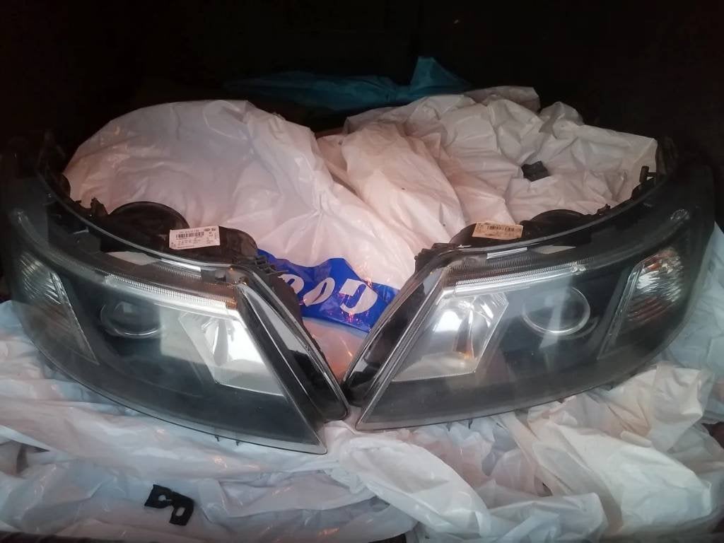 SAAB 9-3 II koplampen HELLA L+R halogeen LED facelift, Ophalen of Verzenden, Nieuw, Saab