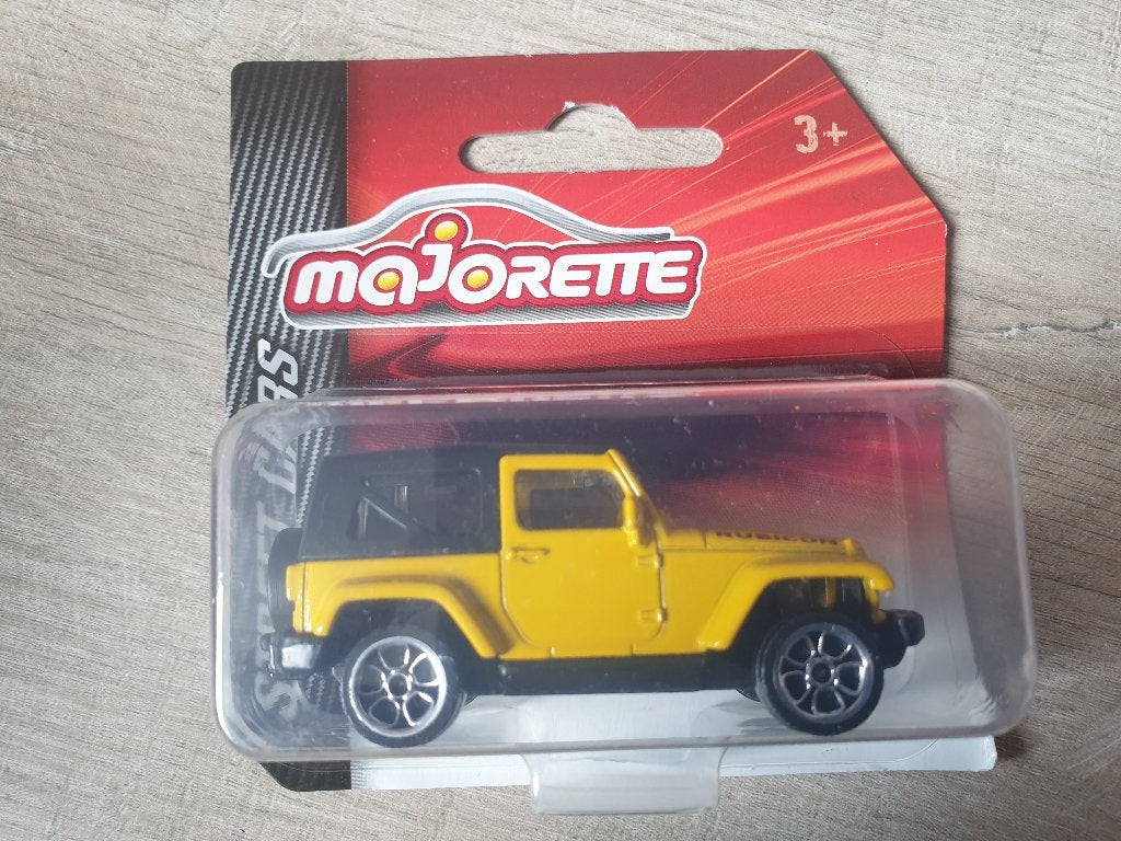 Majorette 224A - Jeep Wrangler Rubicon [geel] 1/60 MIB, Ophalen of Verzenden, Nieuw, Auto