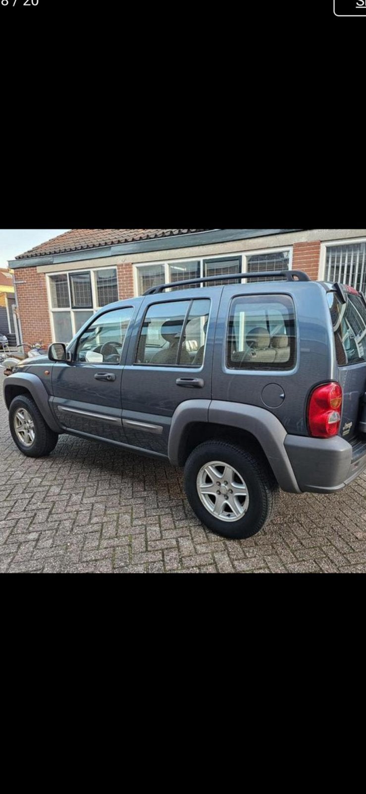 Jeep Cherokee 3.7 V6 Sport BJ 2002 Automaat Blauw €3500.00, Auto's, Automaat, 3700 cc, Beige, Blauw