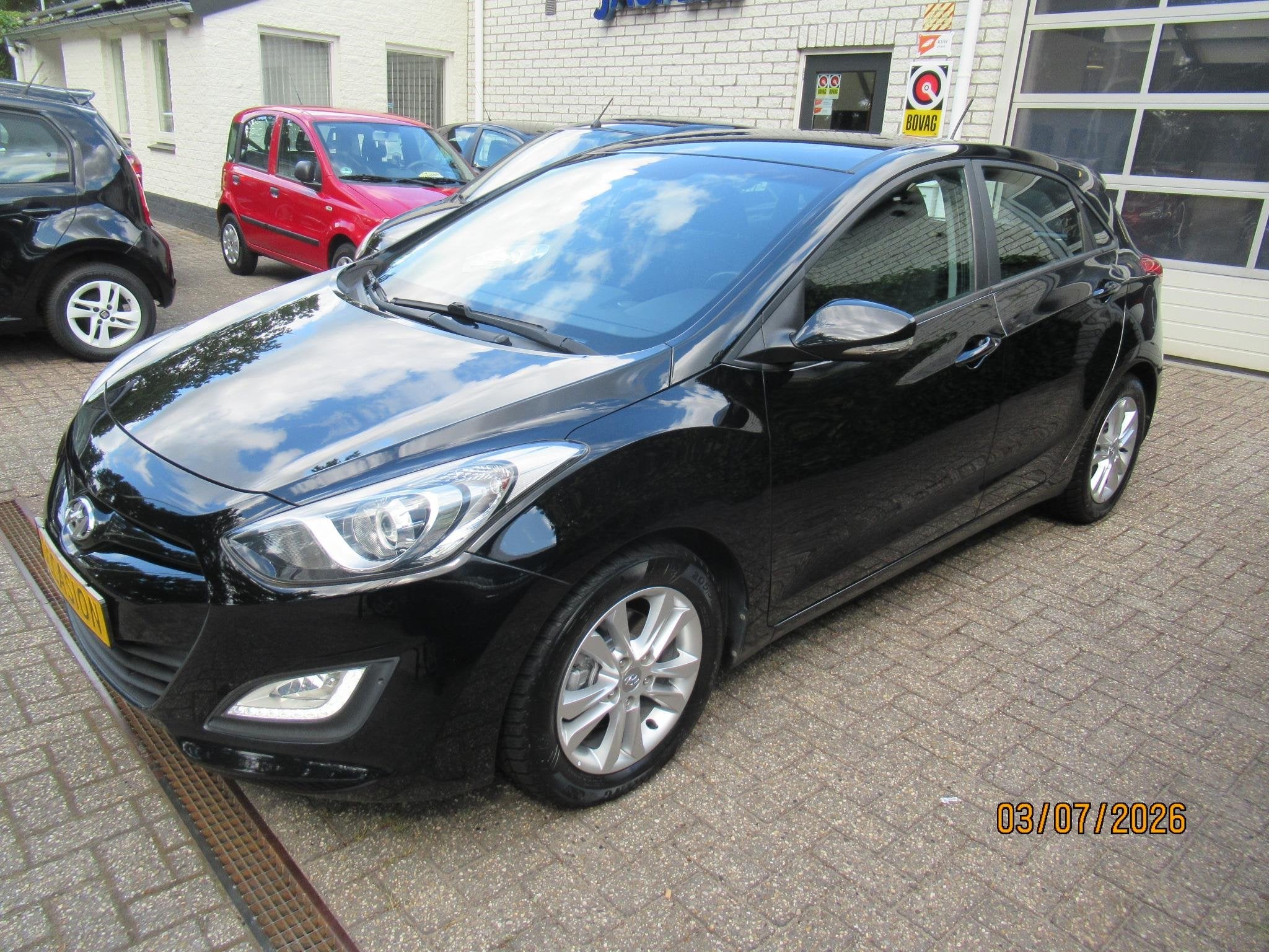 Hyundai i30 1.4i i-Motion Business, Auto's, Stof, Gebruikt, 4 cilinders, 1396 cc