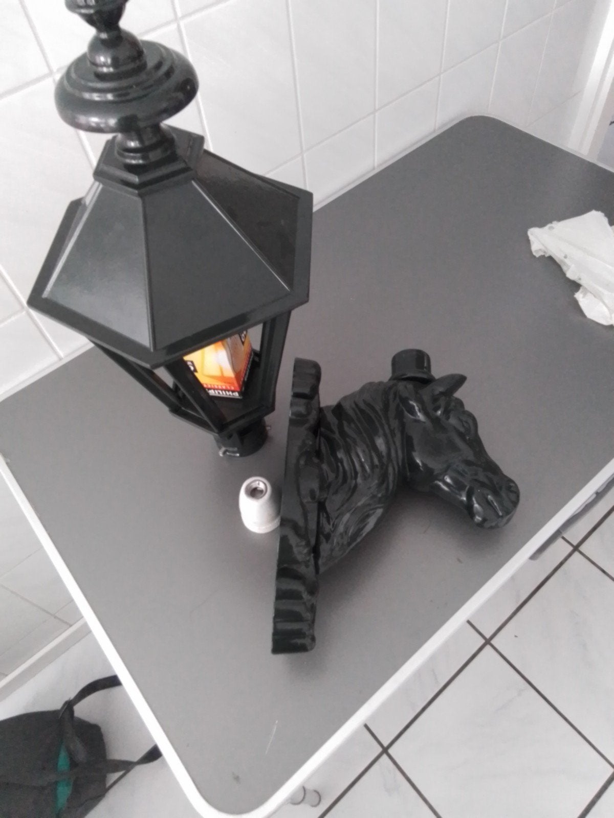 gietijzeren buitenlamp met paardenhoofd decoratie, Ophalen