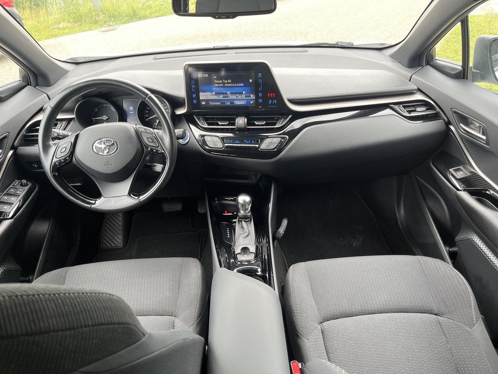Toyota C-HR 1.8 Hybrid Dynamic / Automaat / Camera / Climate, Auto's, 12 maanden, Stof, 4 cilinders, Overige brandstoffen
