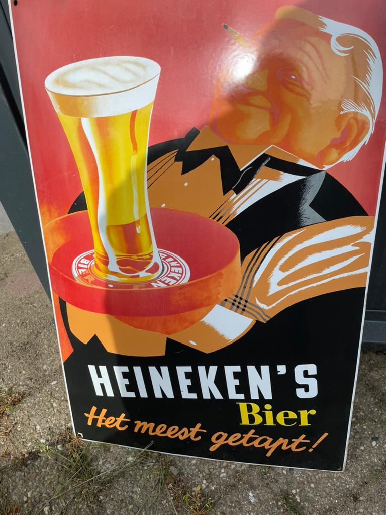 Vintage Heineken's Bier Reclamebord - Het meest getapt!, Ophalen of Verzenden, Gebruikt, Reclamebord