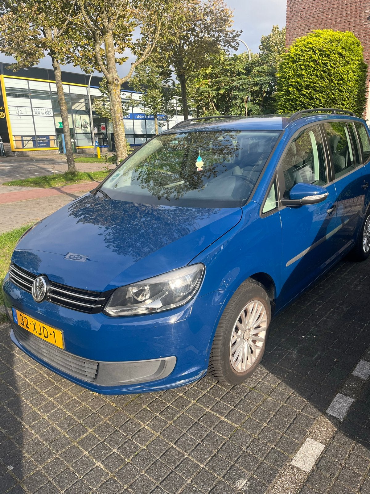 Volkswagen Touran 1.2 TSI 77KW BMT 7P 2012 Blauw, Auto's, Voorwielaandrijving, 4 cilinders, Blauw, 7 stoelen