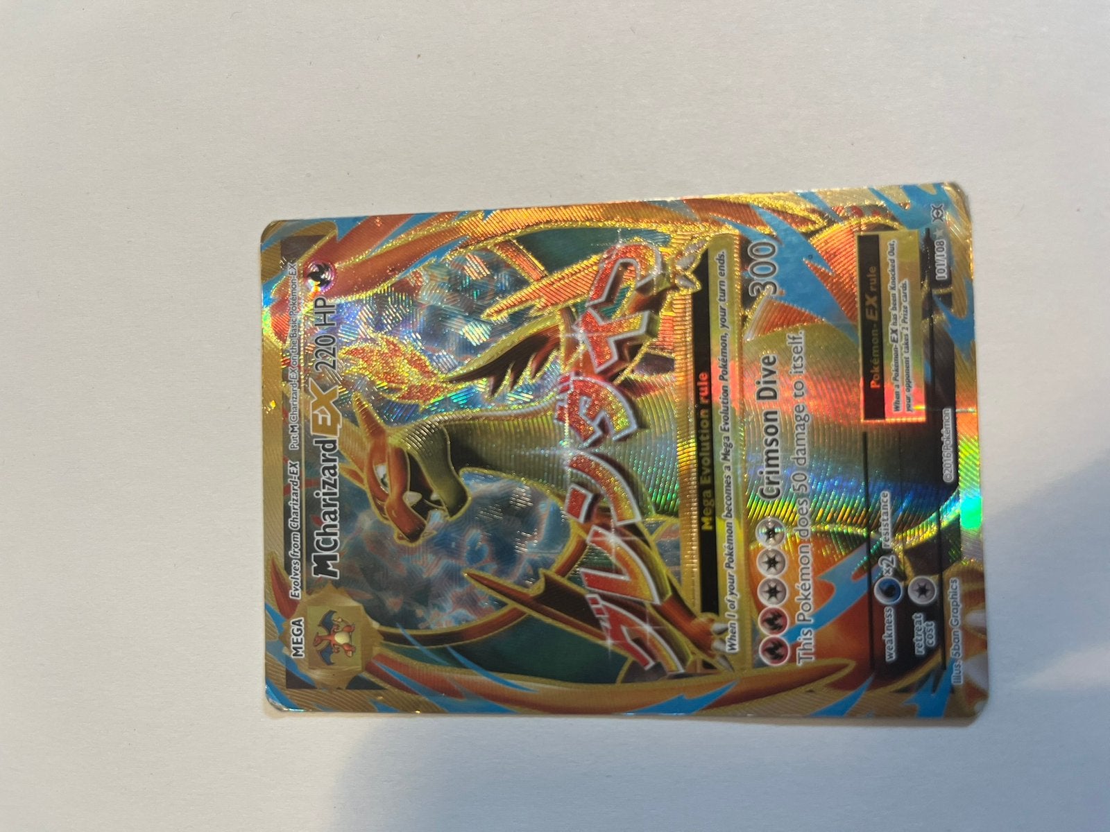 Mega Charizard EX 101, Ophalen of Verzenden, Zo goed als nieuw, Losse kaart, Foil