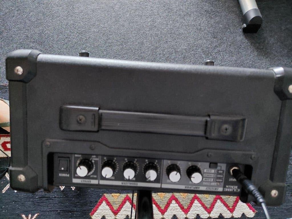 Versterker Roland Cube 10-GX met standard en microphone., Muziek en Instrumenten, Versterkers | Bas en Gitaar, Ophalen, Zo goed als nieuw