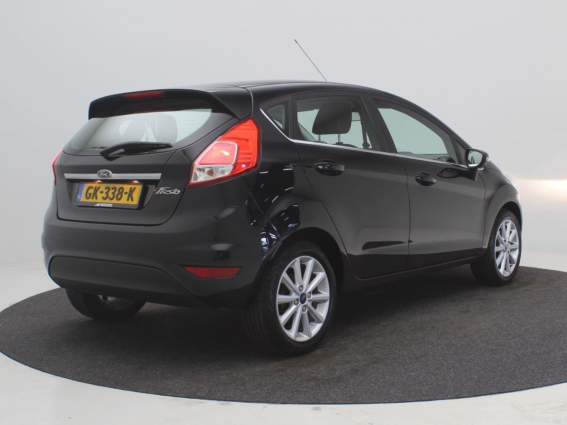 Ford Fiesta 1.0 Titanium / 5-Deurs / Airconditioning / LMV /, Auto's, Ford, Voorwielaandrijving, Stof, Euro 6, 525 kg