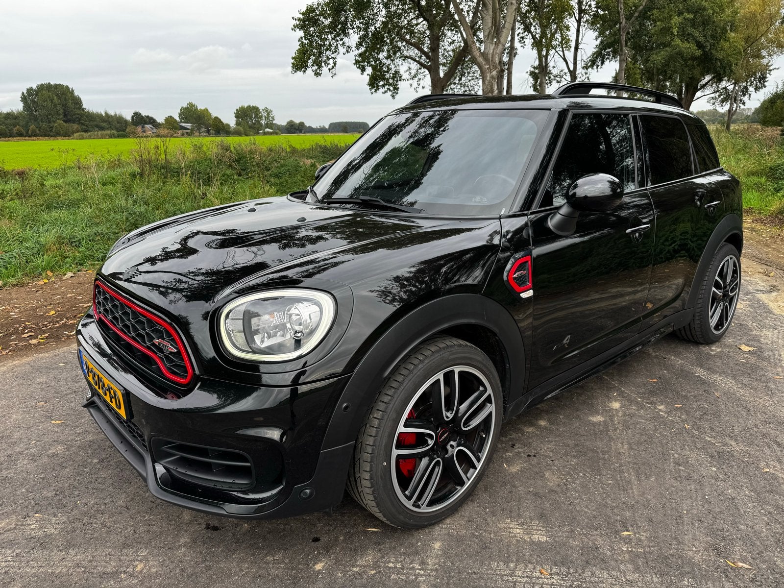 Mini Countryman JCW 231pk All4 Aut. ACC Pano Carplay Works, Auto's, Automaat, Zwart, Zwart, Vierwielaandrijving