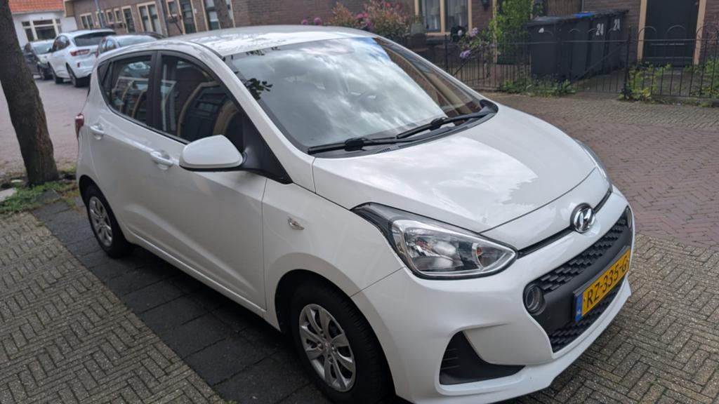 Hyundai i10 1.0i 66pk 2018 Wit, Auto's, Hyundai, Voorwielaandrijving, 4 stoelen, Wit, Origineel Nederlands