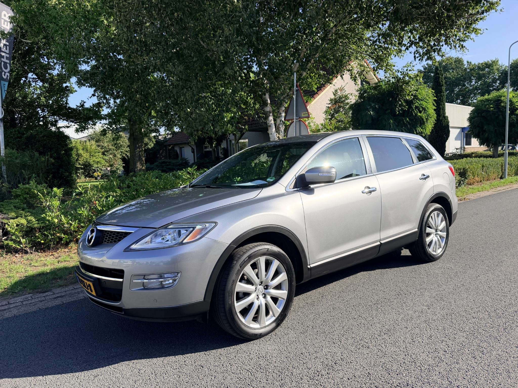 Mazda CX-9 3.7 V6 277PK AUT GT-L 7p Leder•Bose, Auto's, Automaat, Gebruikt, Zwart, 7 stoelen