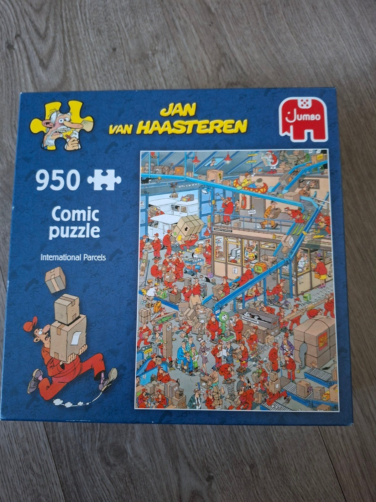Jan van Haasteren puzzel - International Parcels 950 st, Ophalen of Verzenden, 500 t/m 1500 stukjes, Zo goed als nieuw, Legpuzzel