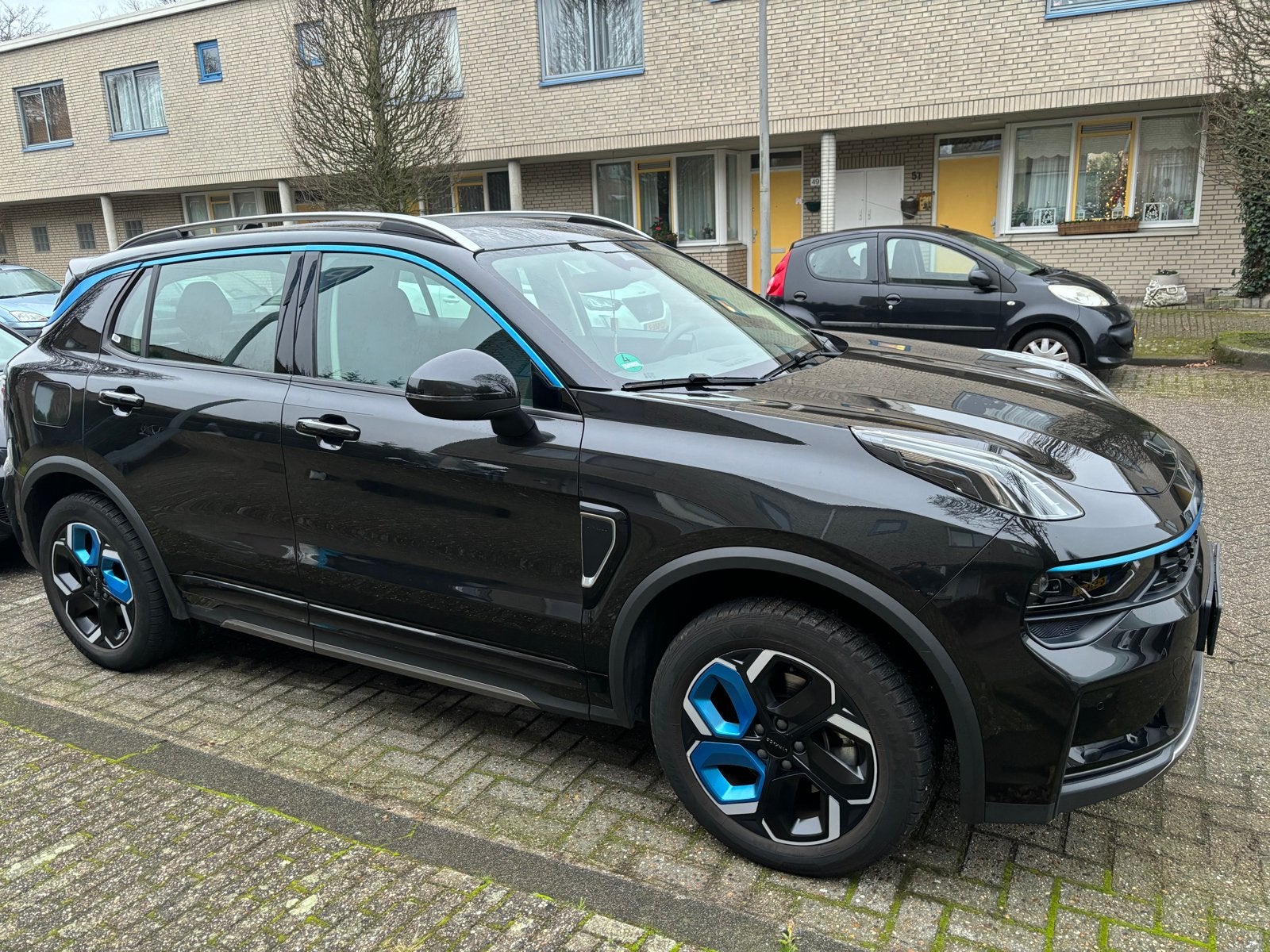 Lynk & Co 1.5TD 261pk HEV 7DCTH 2021 Zwart, Auto's, Lynk & Co, 15 km/l, 143 pk, 1714 kg, Zwart