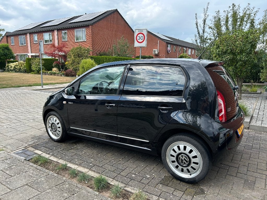 Volkswagen up! 1.0 44KW 2012 Zwart, Auto's, Voorwielaandrijving, Euro 5, Stof, Up!