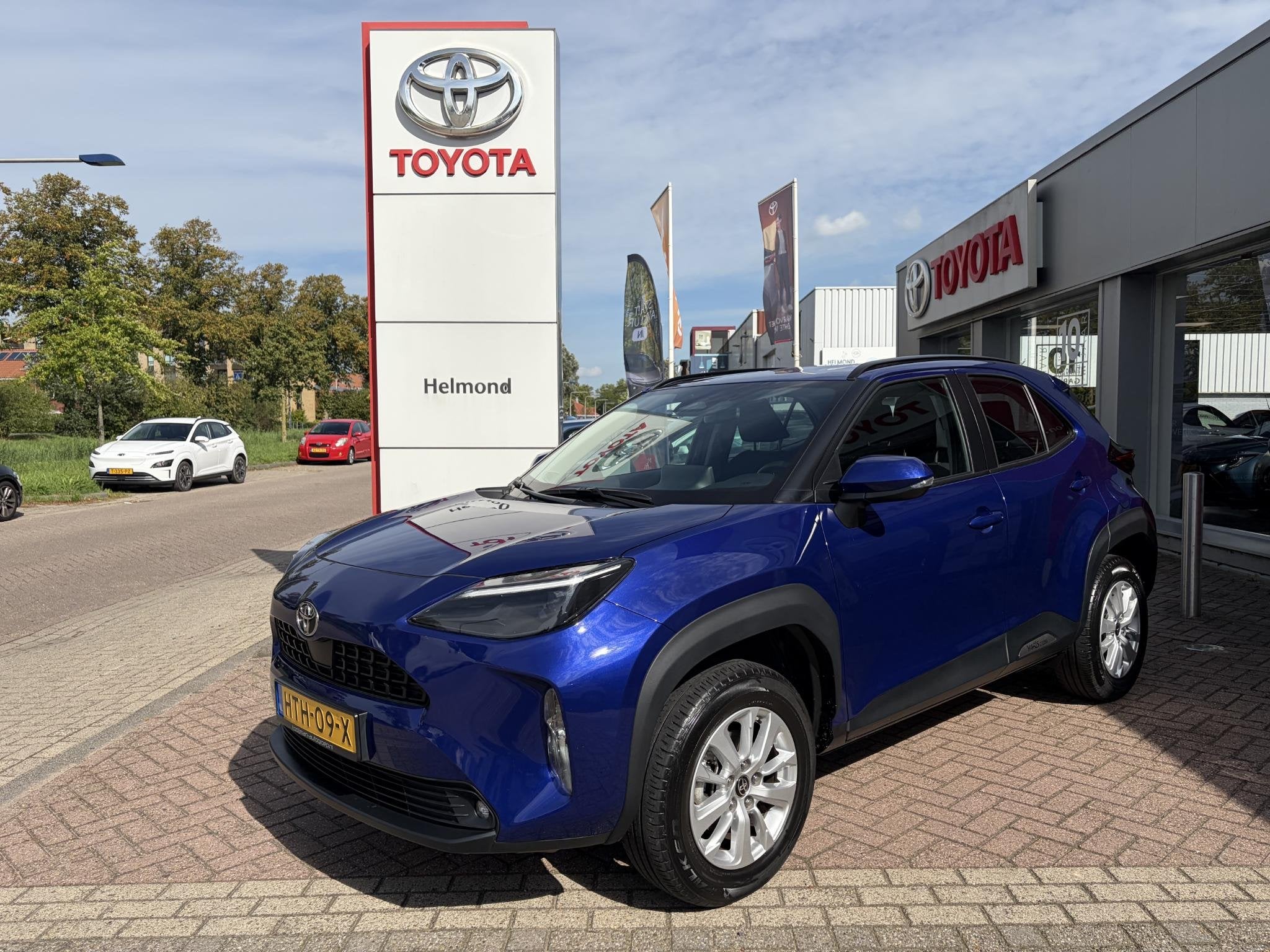 Toyota Yaris Cross 1.5 Hybrid 115 Active, Auto's, Stof, Gebruikt, 1165 kg, Blauw
