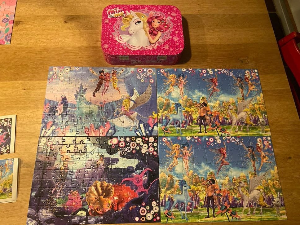 Mia and Me legpuzzels in metalen koffer, Ophalen of Verzenden, Meer dan 50 stukjes, Gebruikt, 6 jaar of ouder