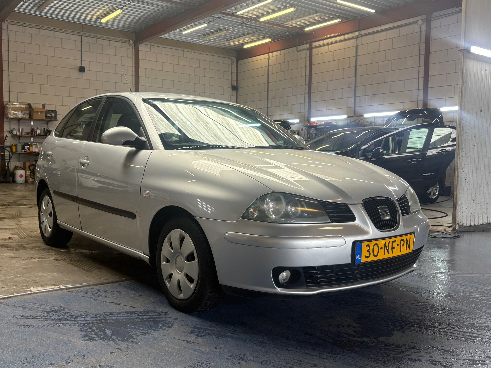 Seat Ibiza 1.4-16V Signo, Auto's, 4 cilinders, Origineel Nederlands, Bedrijf, Verwarmde buitenspiegels