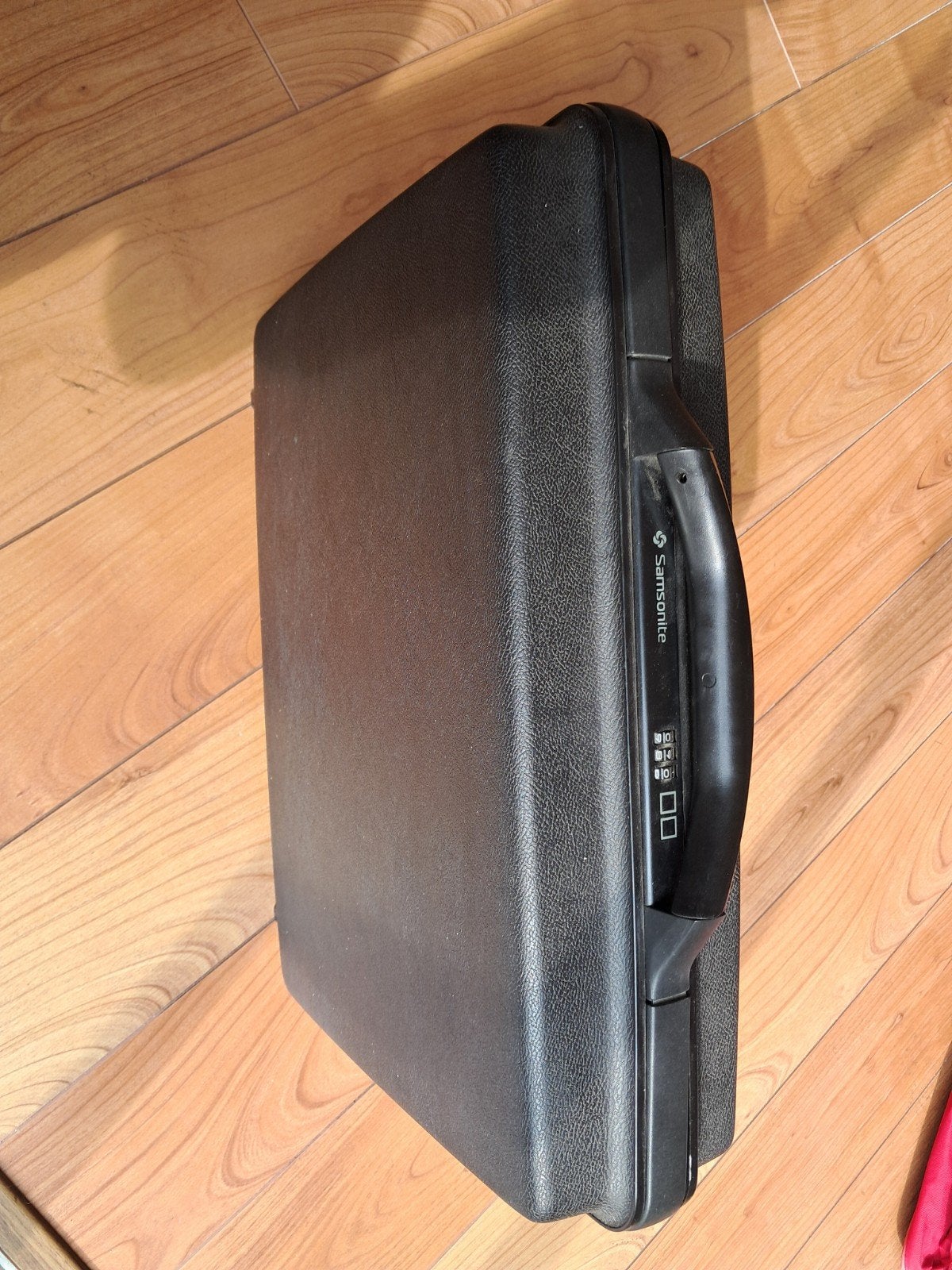 Samsonite hardcase aktetas met cijferslot, Ophalen