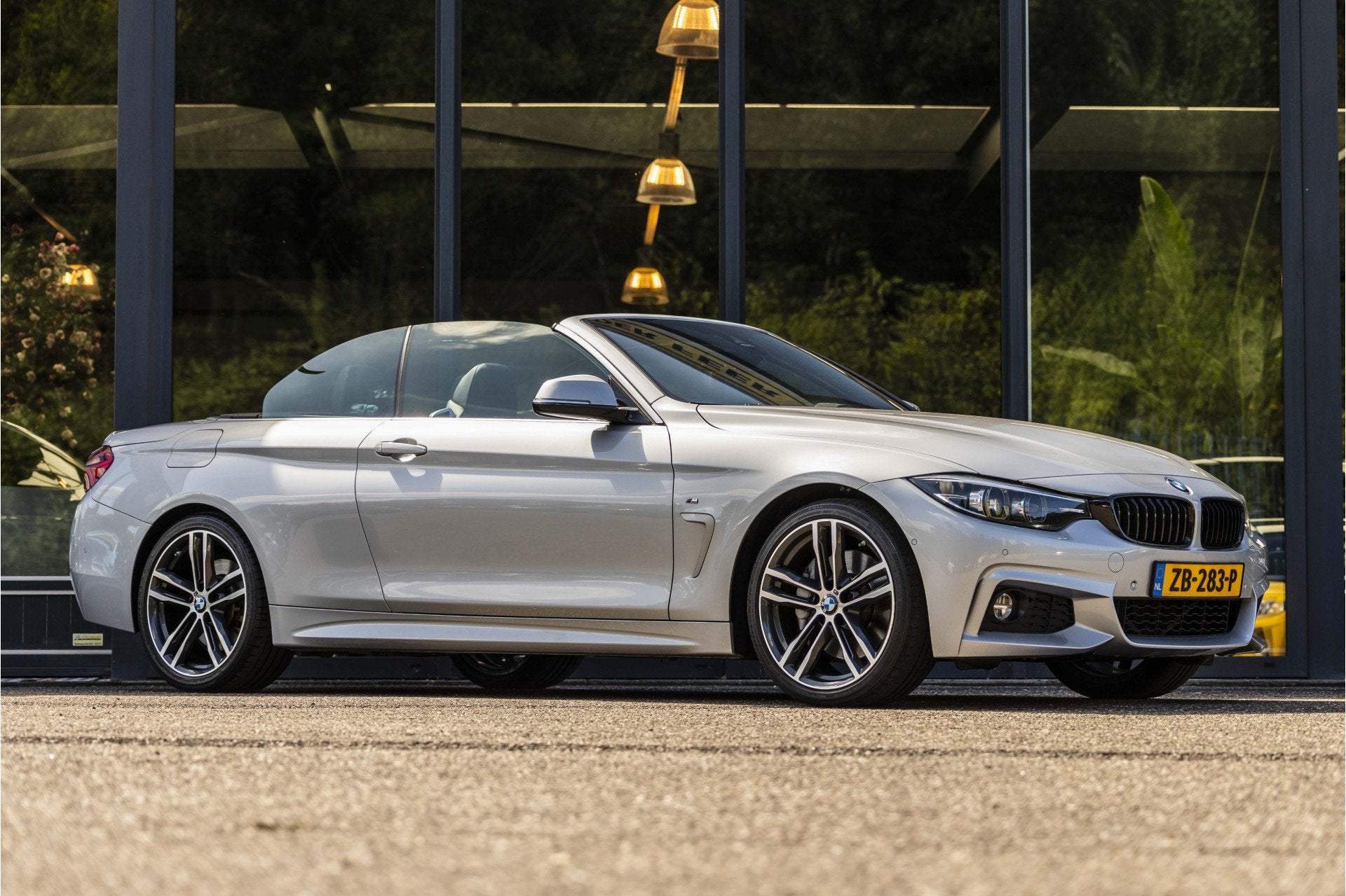 BMW 4 Serie Cabrio 440i High Executive (bj 2019, automaat), Auto's, Automaat, Dealer onderhouden, Achterwielaandrijving, Gebruikt