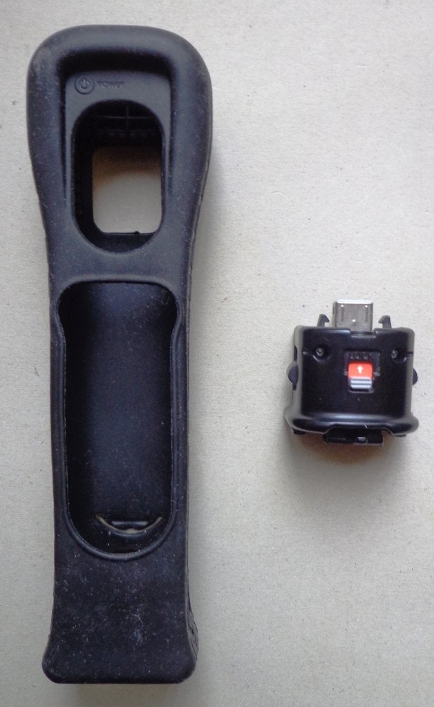 Originele Motion Plus Adapter Zwart + siliconen hoesje, Ophalen of Verzenden, Zo goed als nieuw, Zonder controller