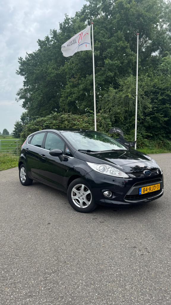Ford Fiësta 1.25 44KW 5DR 2011 Zwart, Auto's, Voorwielaandrijving, Stof, 40 €/maand, 4 cilinders