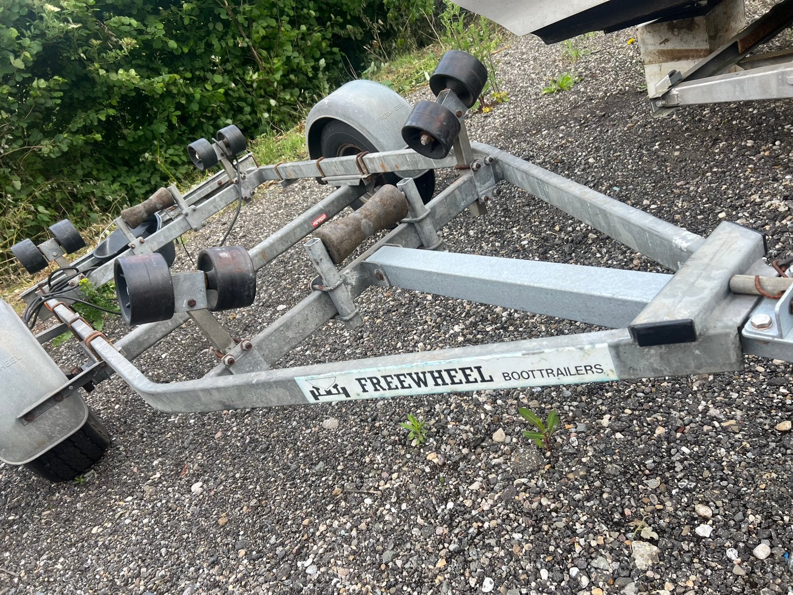 Freewheel boottrailer te koop, Watersport en Boten, Ophalen, Inclusief motor, Zo goed als nieuw, Mercury