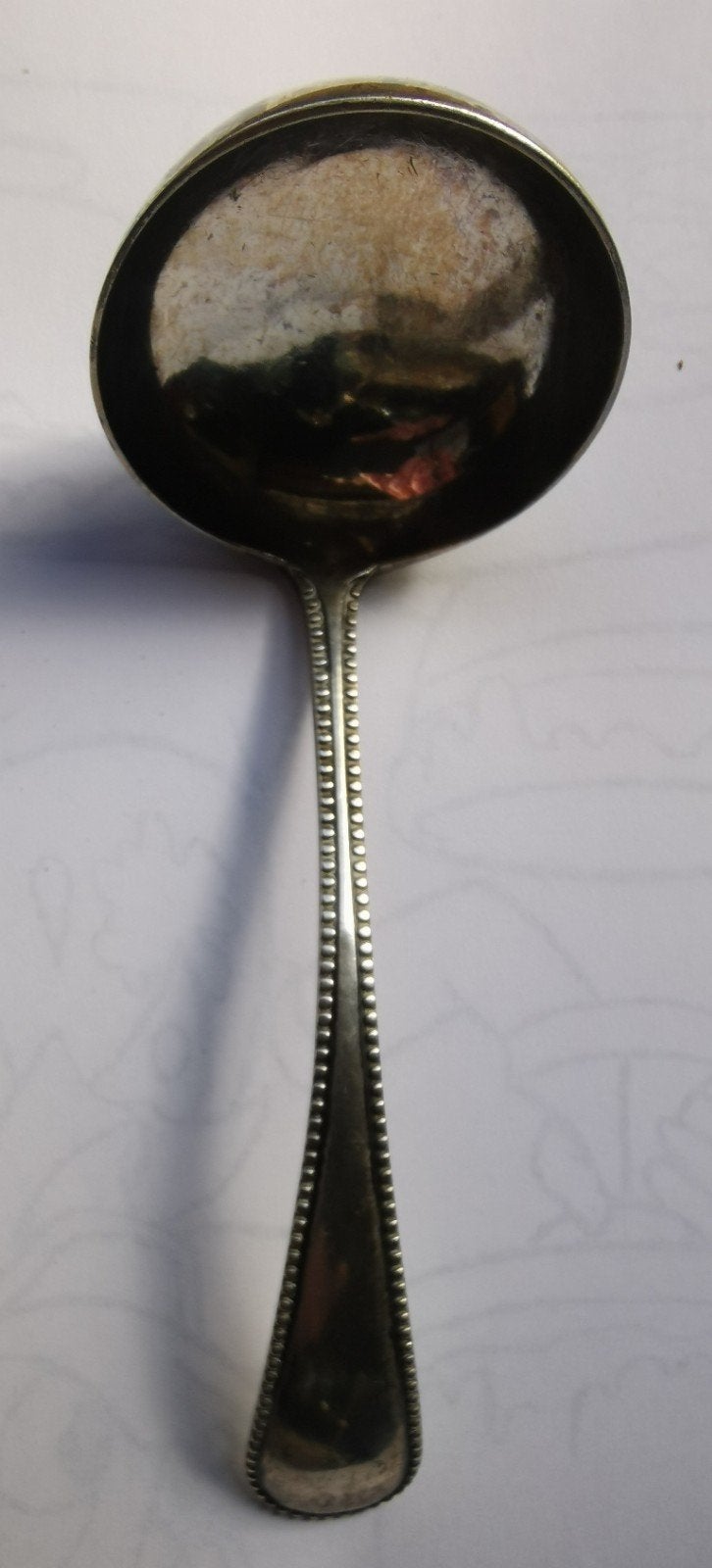 Zilver, zilveren sauslepel met parelrand., Ophalen of Verzenden