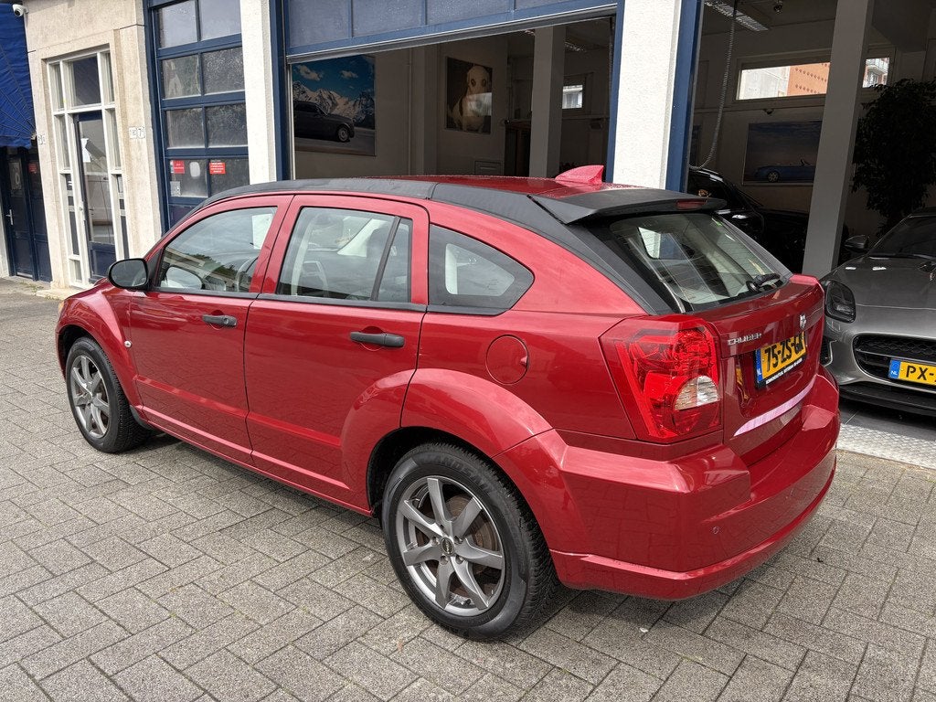 Dodge Caliber 2.0 SE AUTOMAAT/LEDER/AIRCO/NW APK (bj 2007), Auto's, Dodge, 1998 cc, 450 kg, Gebruikt, 1335 kg