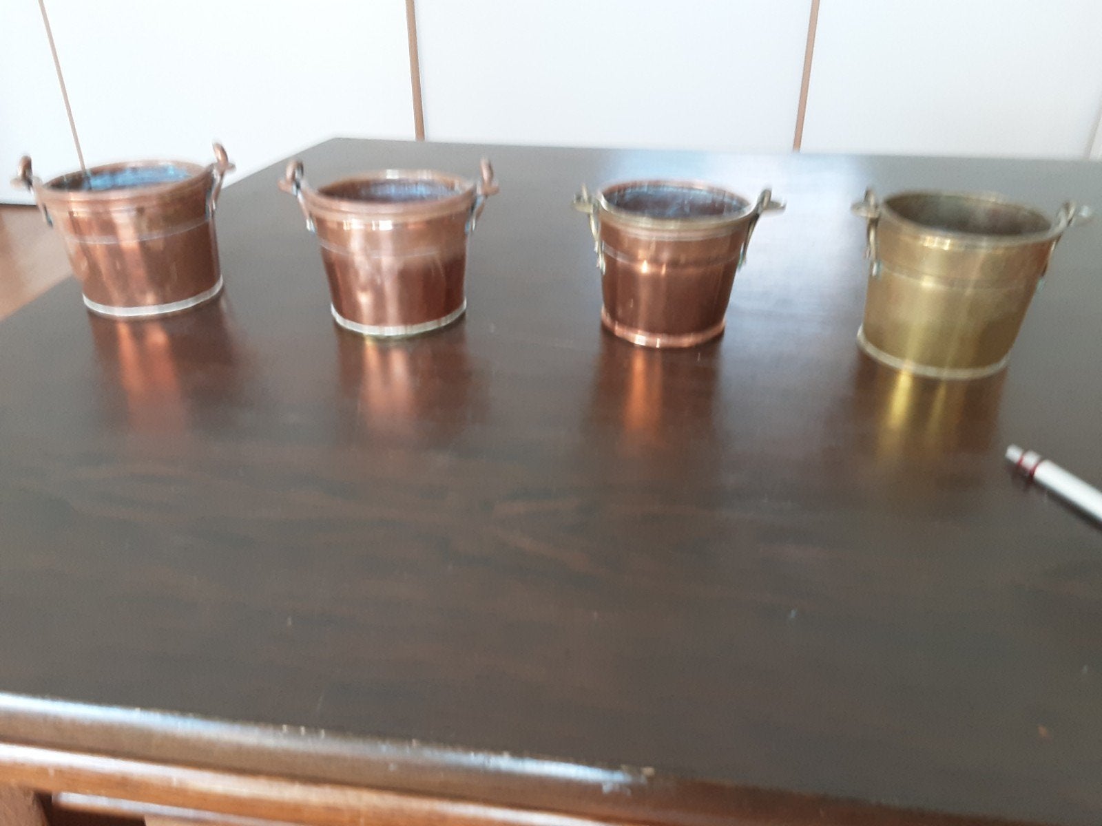 4 koperen emmerjes, Ophalen, Decoratie