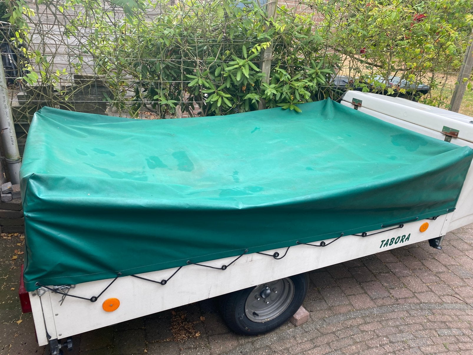 Afdekzeil aanhangwagen, Ophalen, Gebruikt
