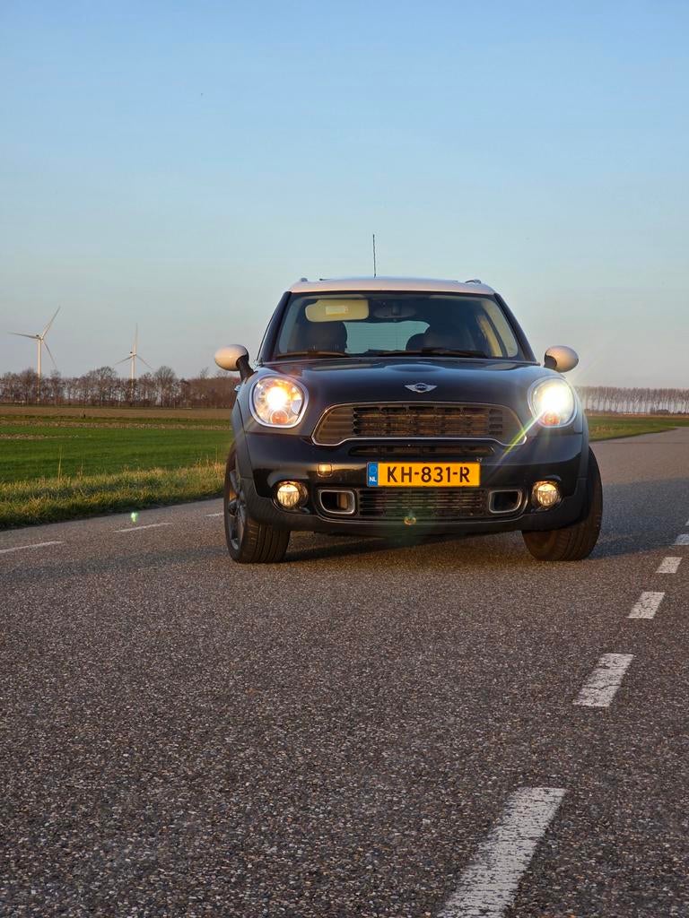 Mini Countryman 1.6 Cooper S All4 AUT 2011 Zwart  lage km, Auto's, Mini, Particulier, Countryman, 4x4, ABS, Airbags, Airconditioning