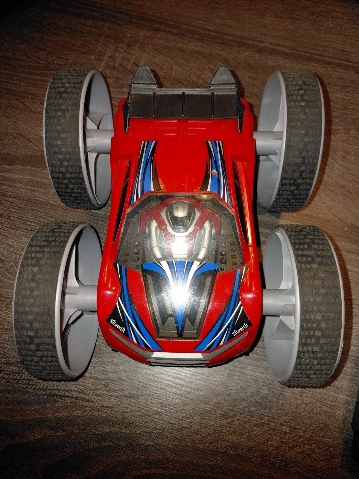 Silverlit Gyro ZEE RC Stunt Auto - Rood/Paars, Hobby en Vrije tijd, Elektro, Gebruikt, Auto offroad, Ophalen of Verzenden