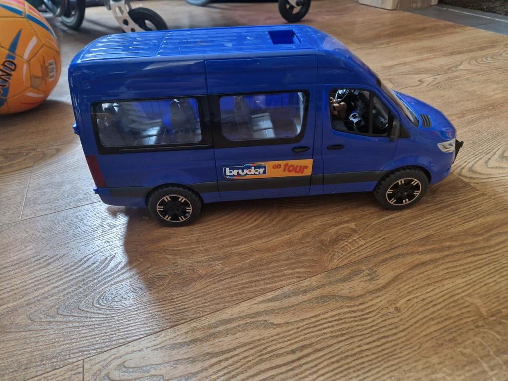 Bruder Taxi met poppetje en deuren die open kunnen, Ophalen of Verzenden