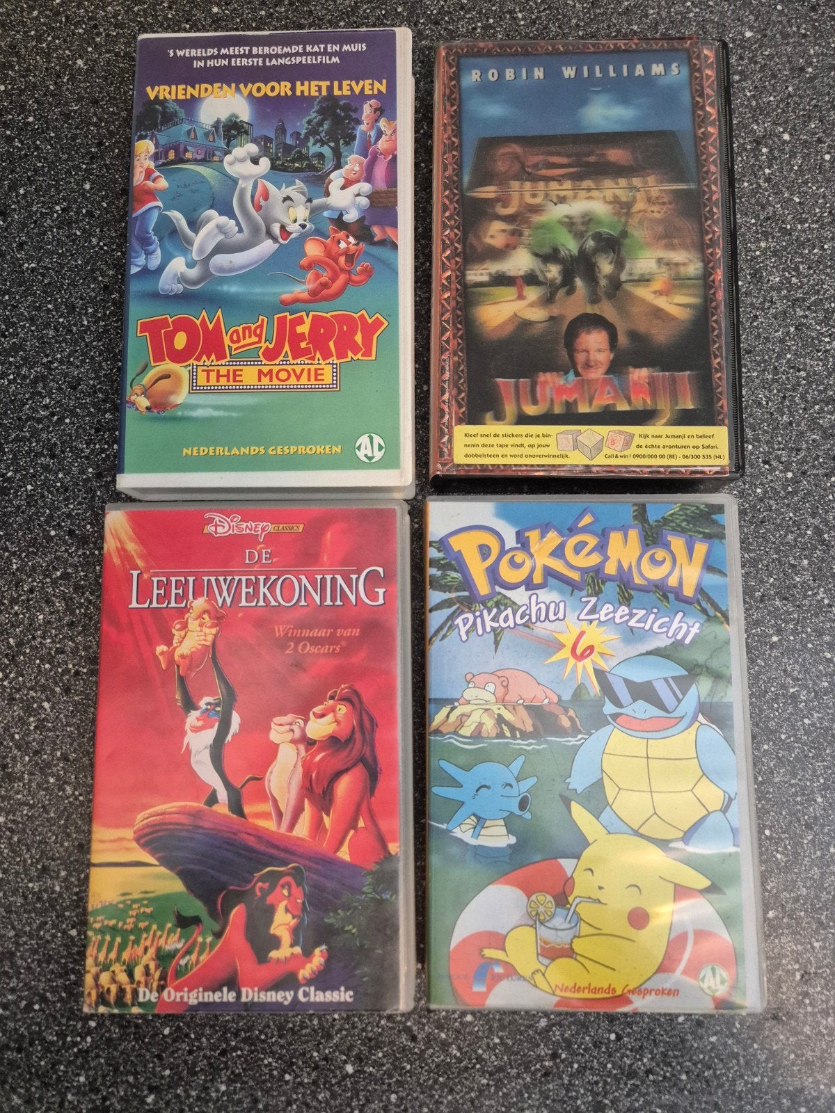 VHS-collectie: Jumanji, Leeuwenkoning, Tom & Jerry, Pokémon, Nederlands ondertiteld, Gebruikt, Alle leeftijden, Ophalen of Verzenden