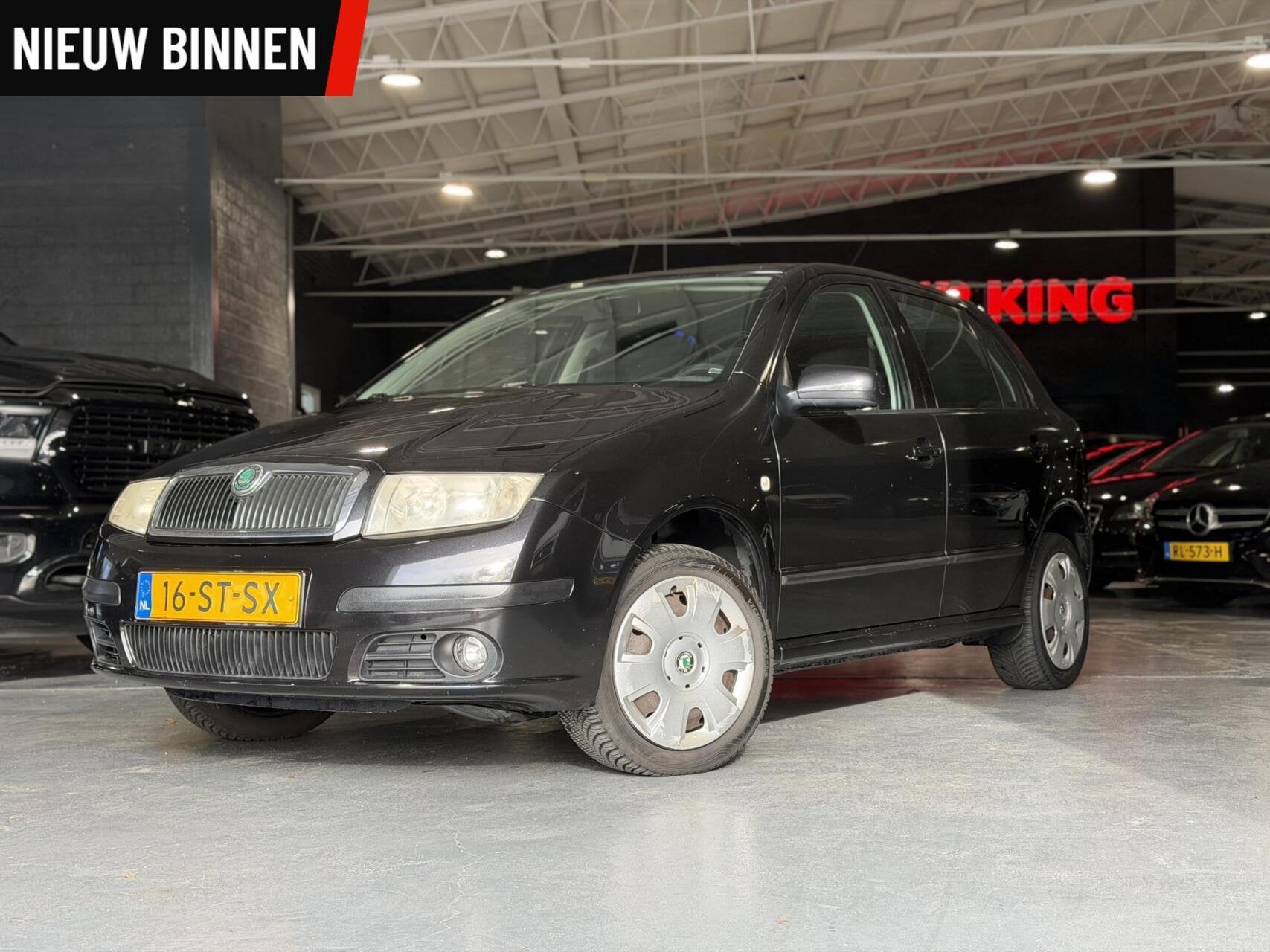 Skoda Fabia 1.4-16V Spirit+ Airco Cruise Trekhaak, Auto's, Voorwielaandrijving, 4 cilinders, Zwart, Origineel Nederlands