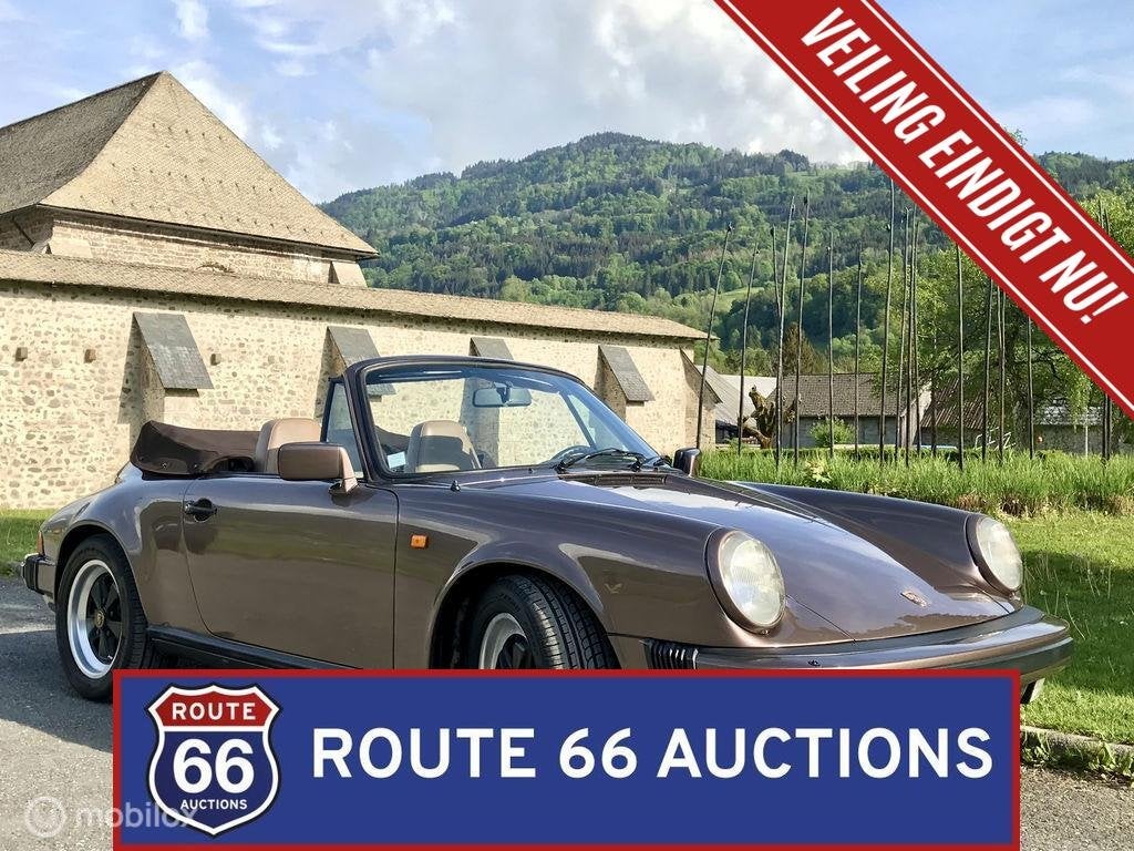 Porsche 911 Carrera 3.2 Cabriolet | 1984 | Route 66 Auctions, Auto's, Oldtimers, Overige carrosserieën, Zwart, Bedrijf, Porsche