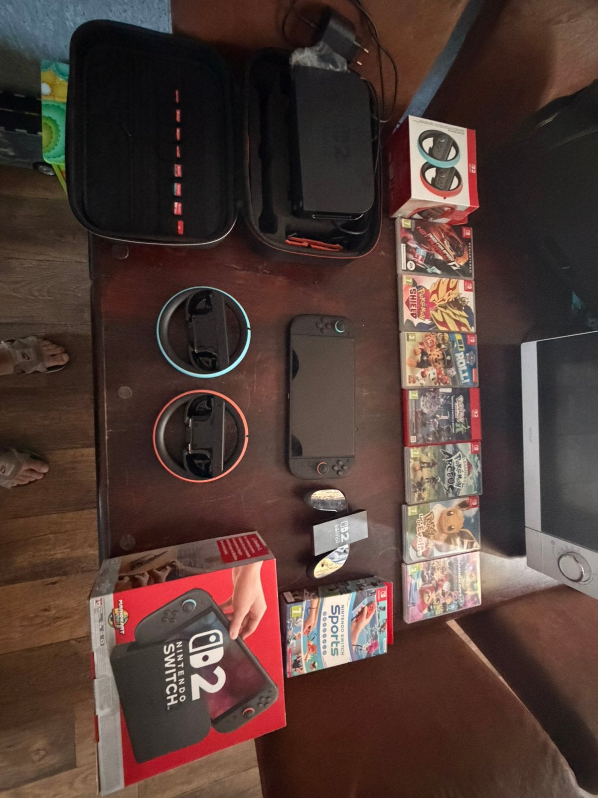 Te koop nintendo swicht 2 met 10 spellen en 2 racestuurtjes, Spelcomputers en Games, Ophalen, Met games, Zo goed als nieuw, Switch Original