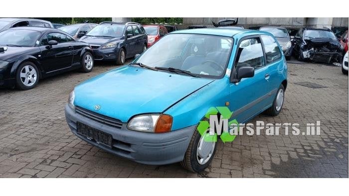 Schokdemperpoot links-achter van een Toyota Starlet, Gebruikt, -, -, Ophalen of Verzenden