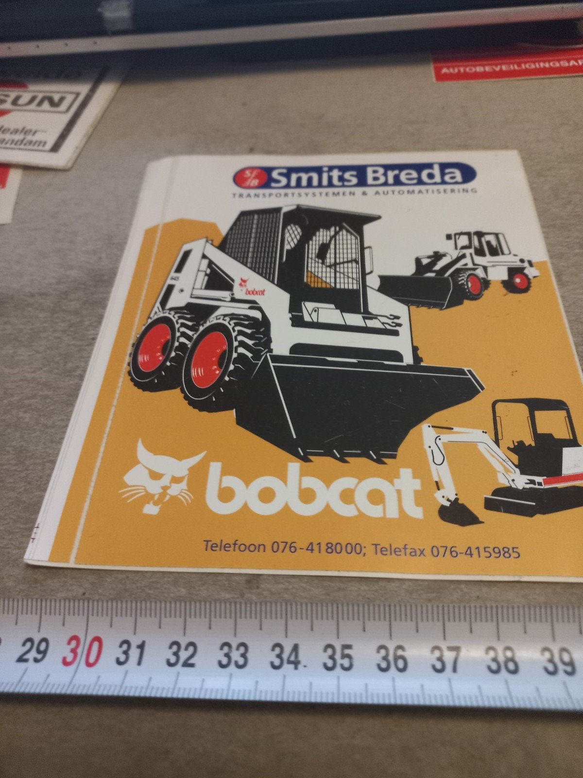 Bobcat sticker Smits Breda - Transport & Automatisering, Ophalen of Verzenden, Gelezen, Smits Breda / Bobcat, Folder