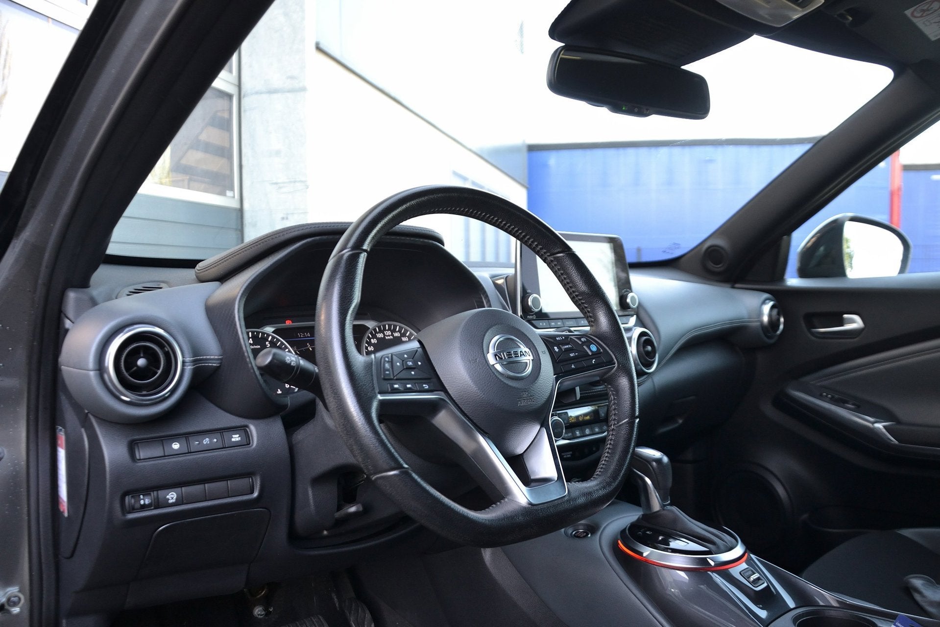 Foto 7 van Nissan Juke 1.0 DIG-T Tekna Automaat | Navigatie | Stoelverw