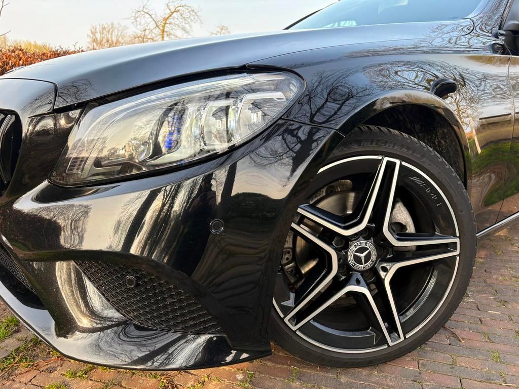 Mercedes-Benz C-klasse Estate 180 AMG/CARPLAY/NAVI/CRUIS/VOL, Automaat, Leder en Stof, Zwart, 14 km/l