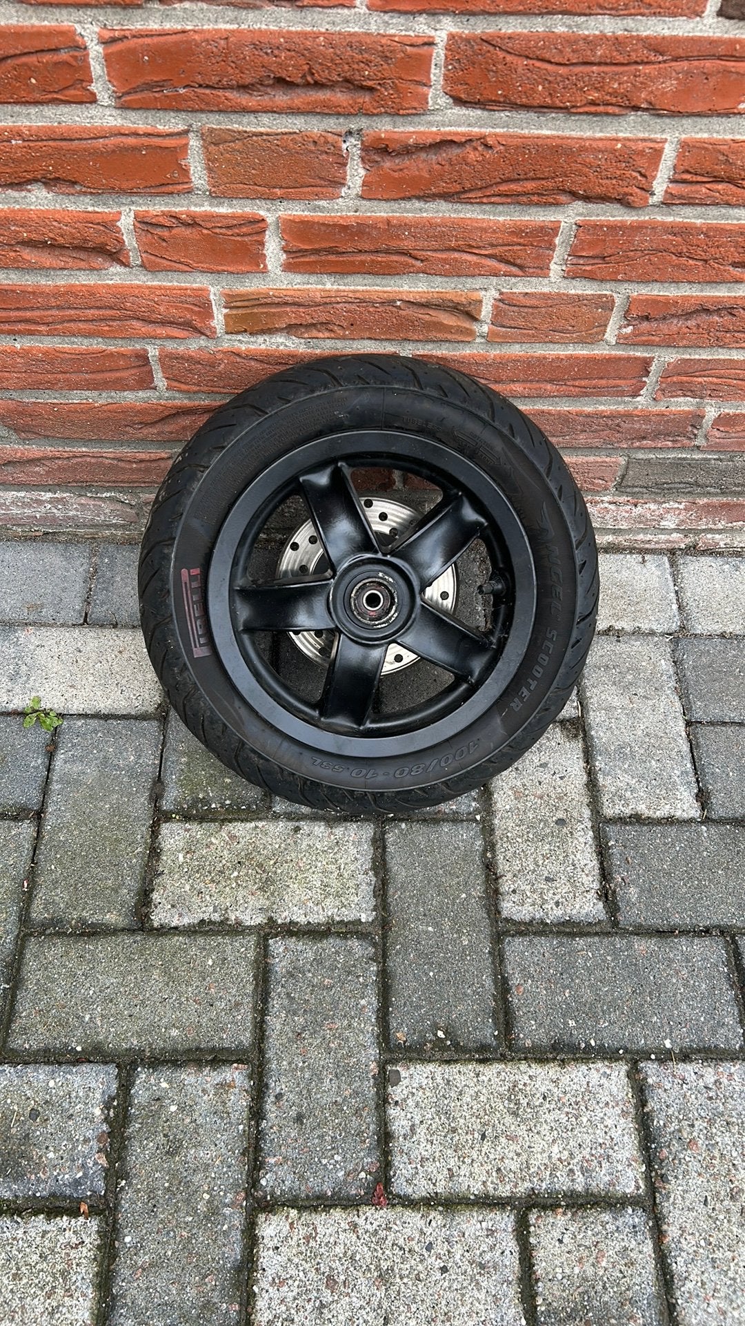Piaggio zip voorband, Ophalen