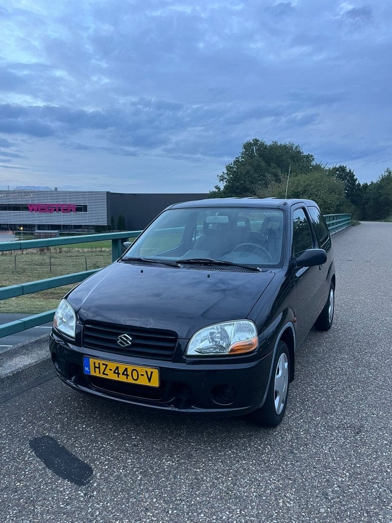 Suzuki Ignis 1.3 GL 2003 Zwart | APK 03-2027, Auto's, Voorwielaandrijving, 83 pk, 31 €/maand, Ignis