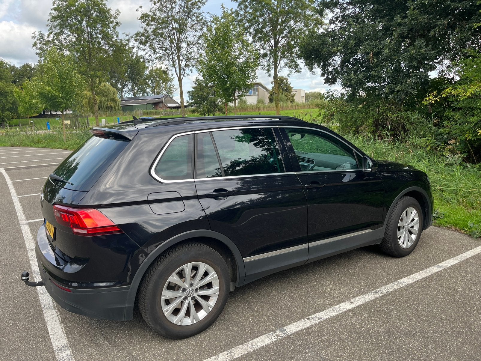 Volkswagen Tiguan 1.4 TSI 110KW/150PK 6DSG M16 2017 Zwart, Auto's, 1800 kg, 4 cilinders, Zwart, Origineel Nederlands