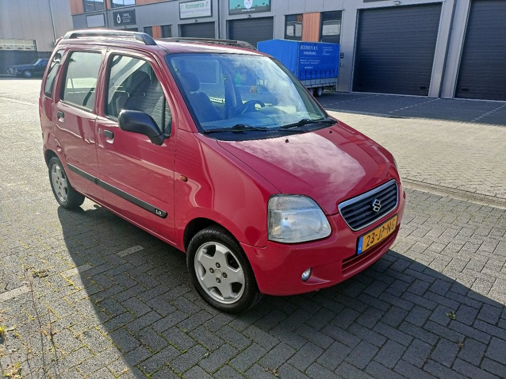 Suzuki Wagon R+ 1.3 AUT 2002 Rood, Auto's, Stof, 40 €/maand, 4 cilinders, 925 kg