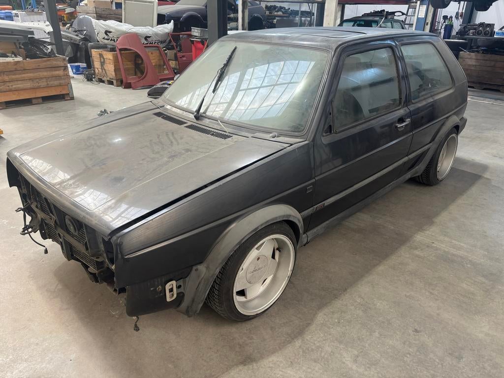 Volkswagen Golf 1.8 GTI G60 U9 1990 Zwart, Auto's, Voorwielaandrijving, 4 cilinders, 160 pk, Zwart