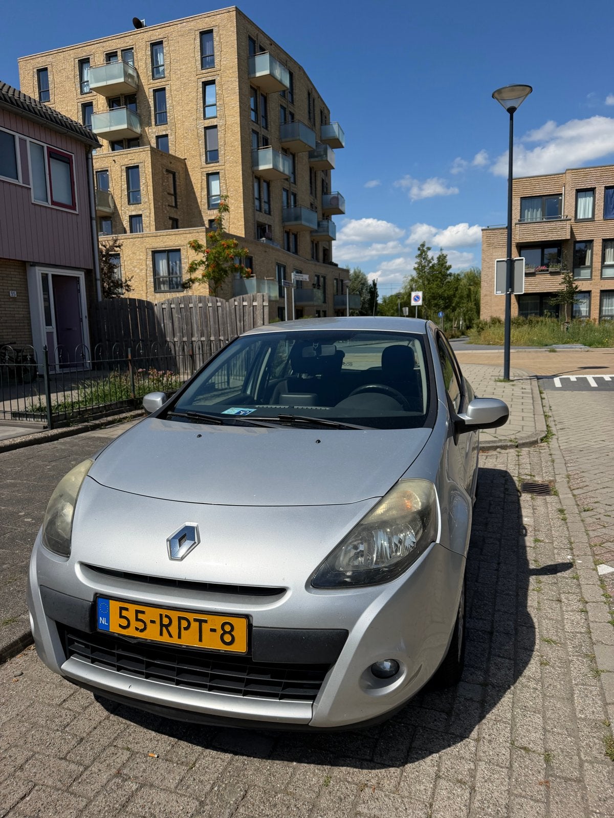 Renault Clio 1.2 16V 55KW 5-DRS E4 2011 Grijs, Auto's, Voorwielaandrijving, Euro 5, Stof, 74 pk