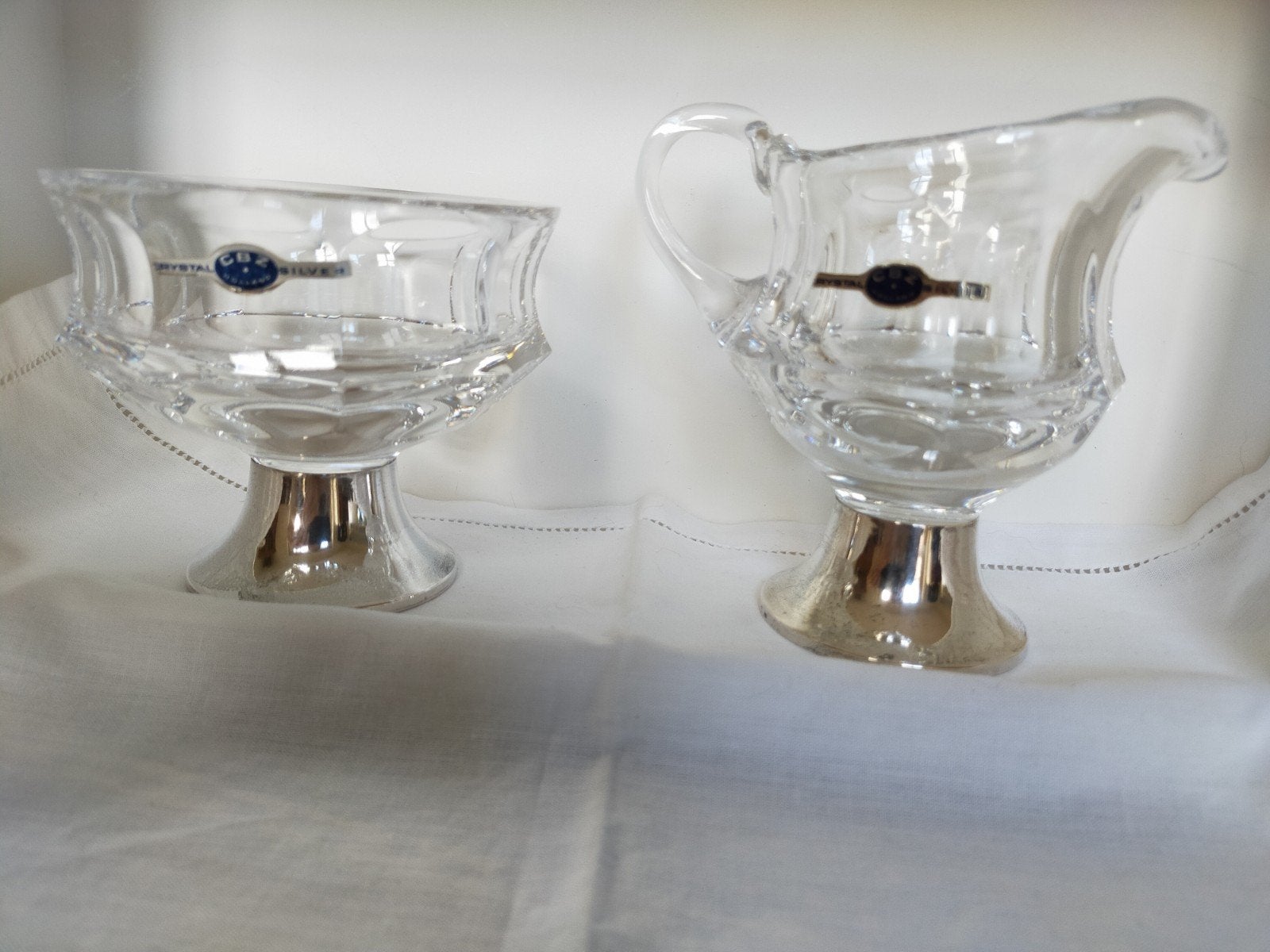 Roomstel van zwaar kristal, met zilveren voetjes., Ophalen of Verzenden, Zilver